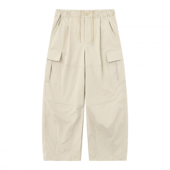 Men's loose-fitting cargo pants with high waistband, drawstring, and patch flap pockets Mune Fashion