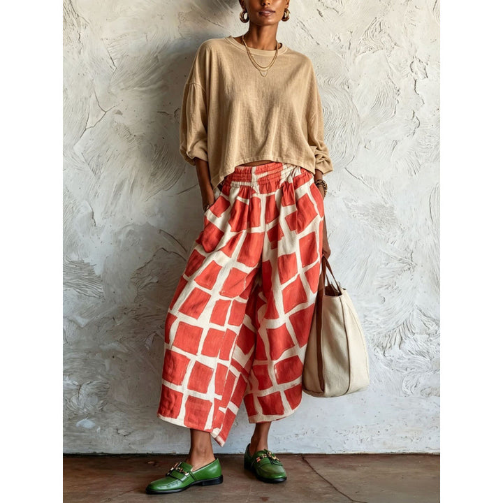 Women's patterned culotte palazzo pants with wide legs, elastic waistband, and side pockets