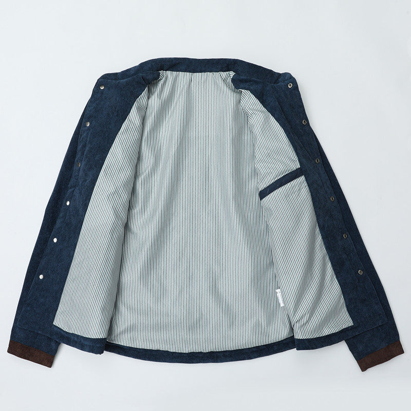 Men's quilted jacket in cord mix with contrast shoulder section and concealed snap button placket Mune Fashion