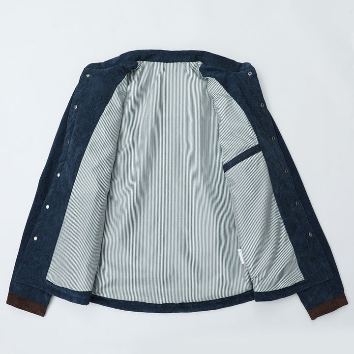 Men's quilted jacket in cord mix with contrast shoulder section and concealed snap button placket Mune Fashion