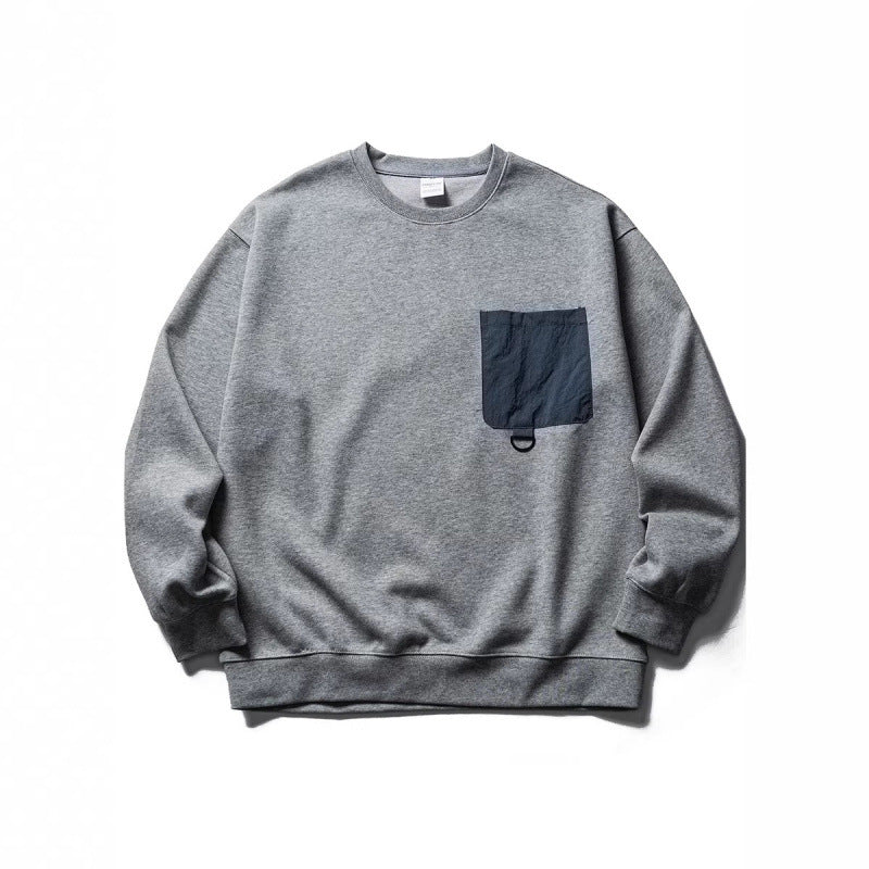 Unisex Oversize Sweatshirt with contrasting chest pocket and D-ring Mune Fashion