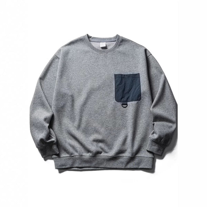 Unisex Oversize Sweatshirt with contrasting chest pocket and D-ring Mune Fashion