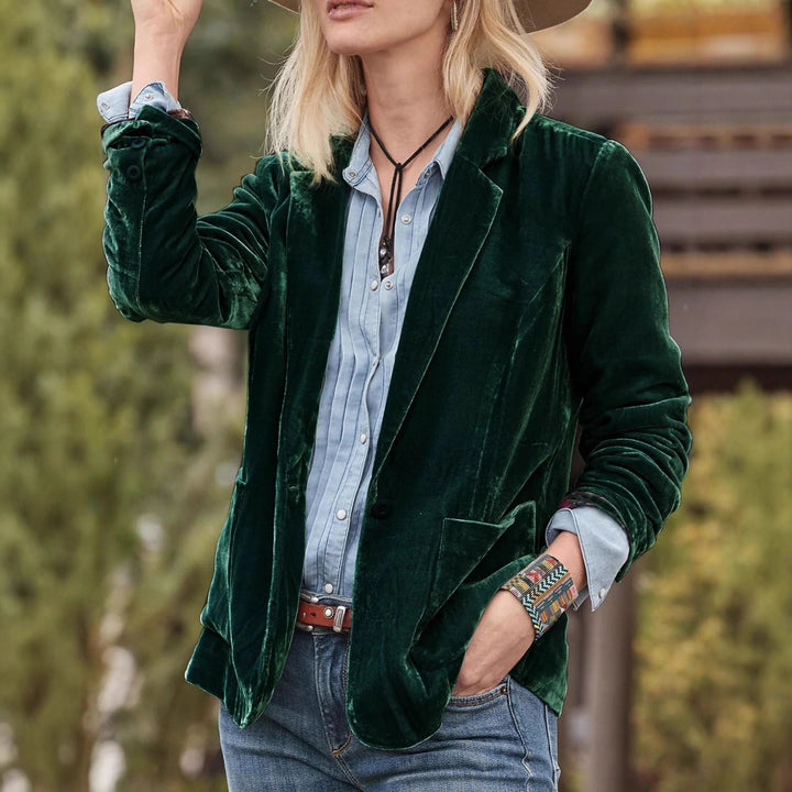 Women's velvet blazer with classic lapels and soft drape