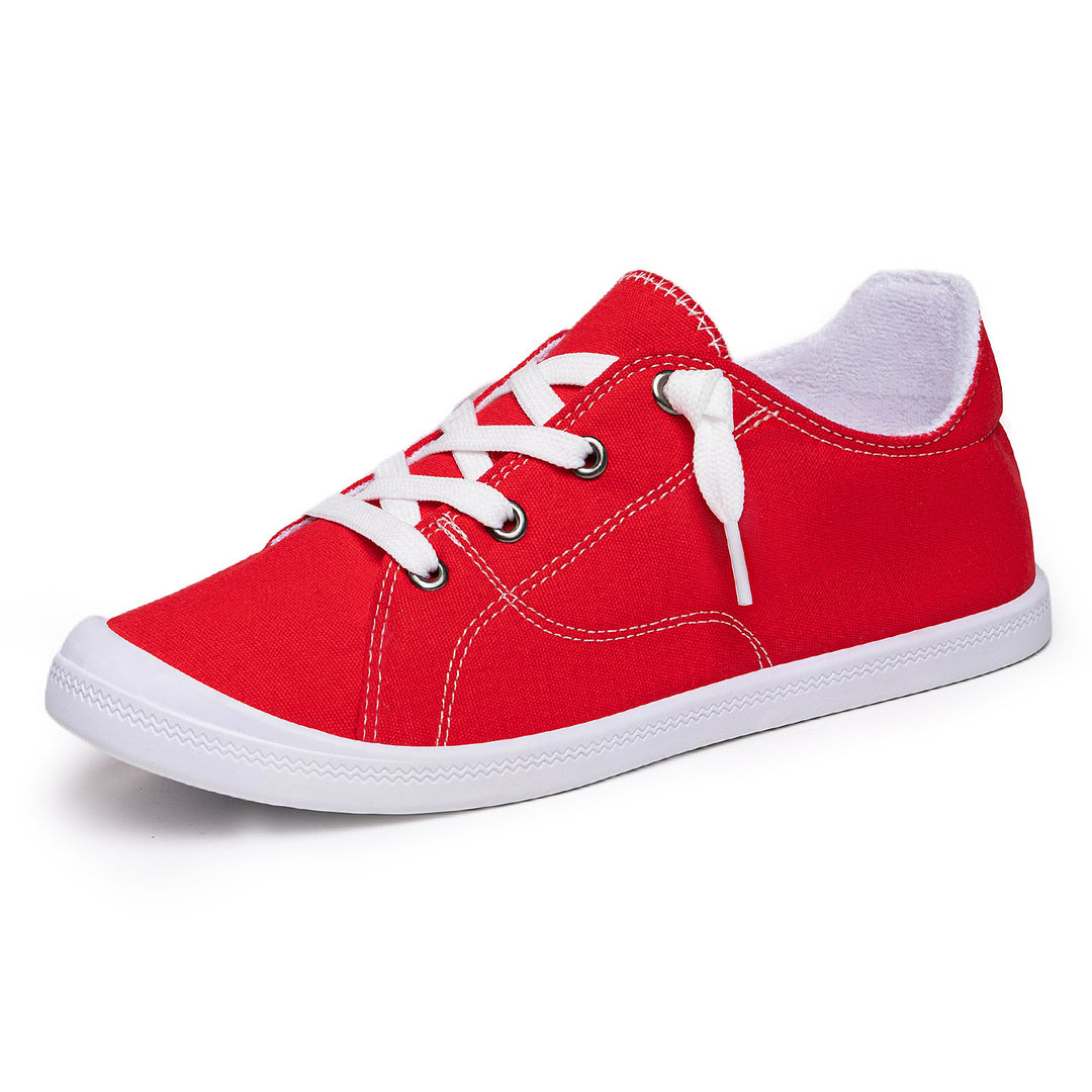 Women’s classic canvas low-top sneakers with reinforced rubber sole, metal eyelets, and padded heel collar Mune Fashion