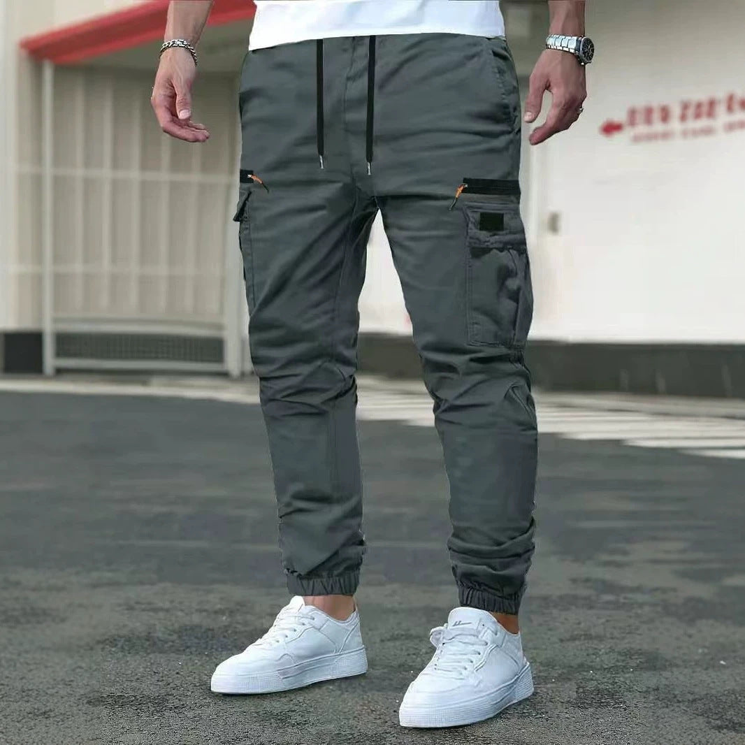 Men's Tapered Cargo Pants in Jogger Style with Elastic Waistband, Drop-Crotch Pocket & Zipper Pockets Mune Fashion