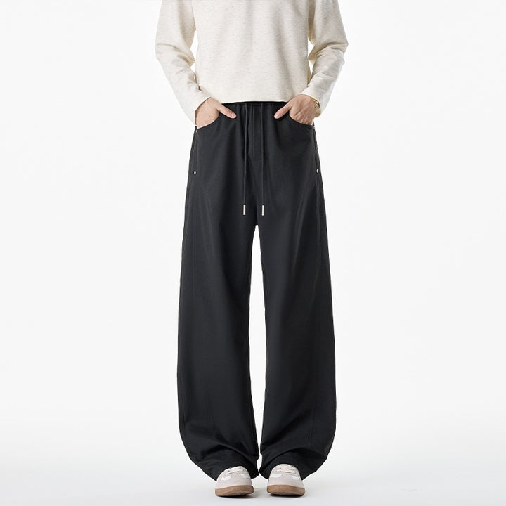 Ladies wide-cut lounge pants with drawstring, high waist and deep side pockets Mune Fashion