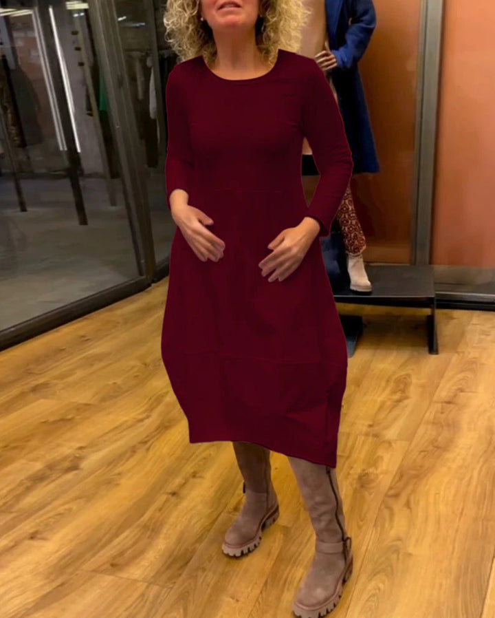 Women's asymmetrical balloon dress with three-quarter sleeves, side pockets, and flowing pointed hem Mune Fashion