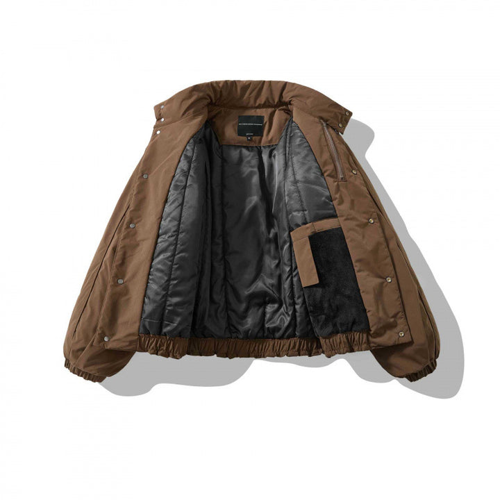 Unisex Oversized padded short jacket with high stand-up collar and elastic hems Mune Fashion