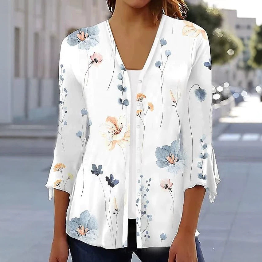 Women's light chiffon blouse with watercolor flower print, V-neck, button placket and three-quarter sleeves Mune Fashion