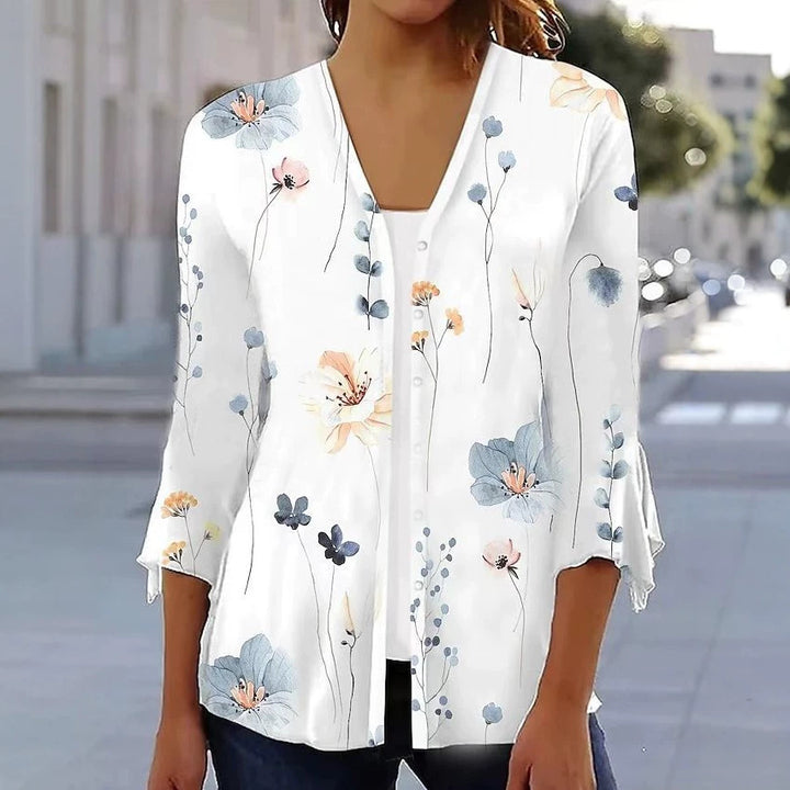 Women's light chiffon blouse with watercolor flower print, V-neck, button placket and three-quarter sleeves Mune Fashion