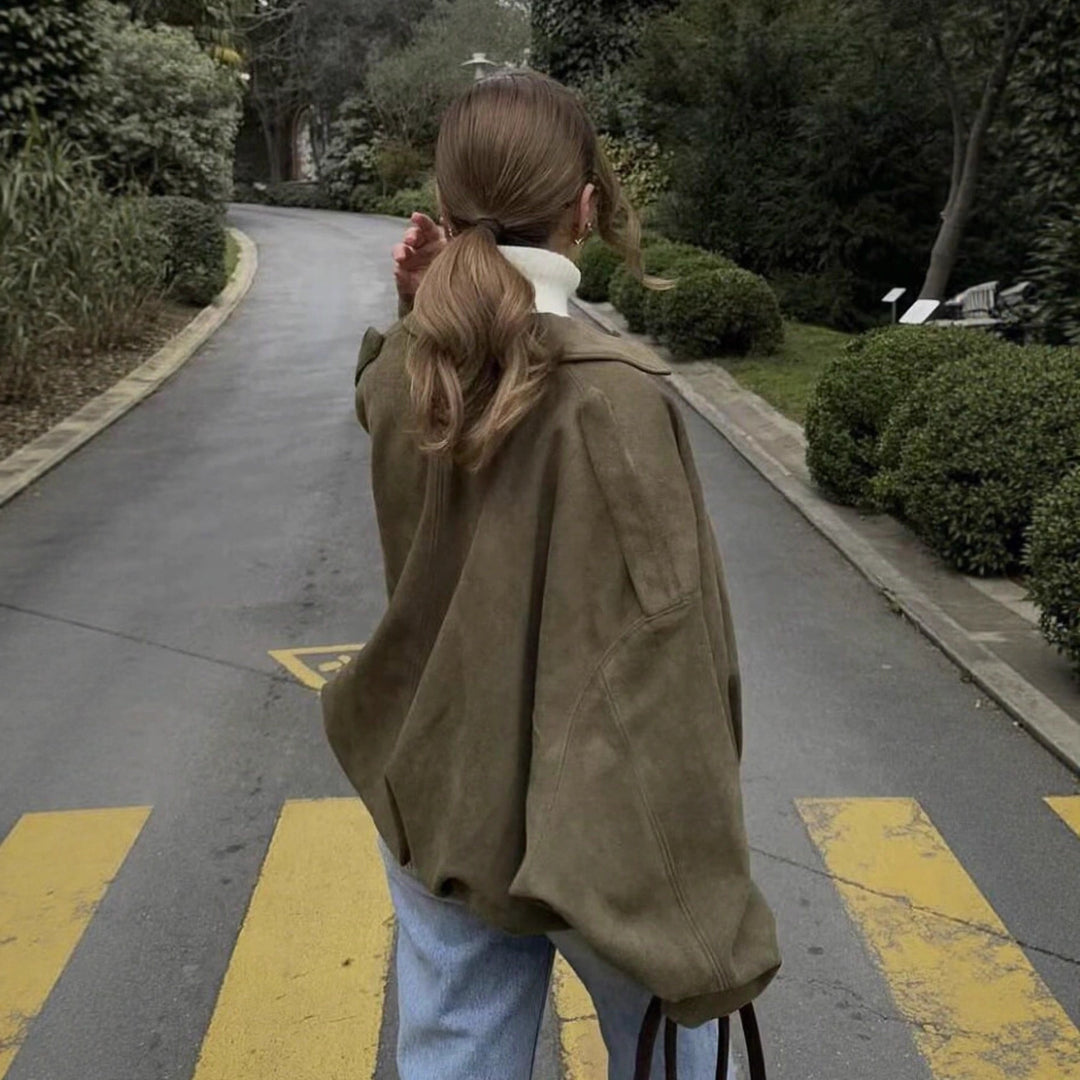 Women's loose short jacket with balloon hem, concealed closure and shoulder flaps Mune Fashion