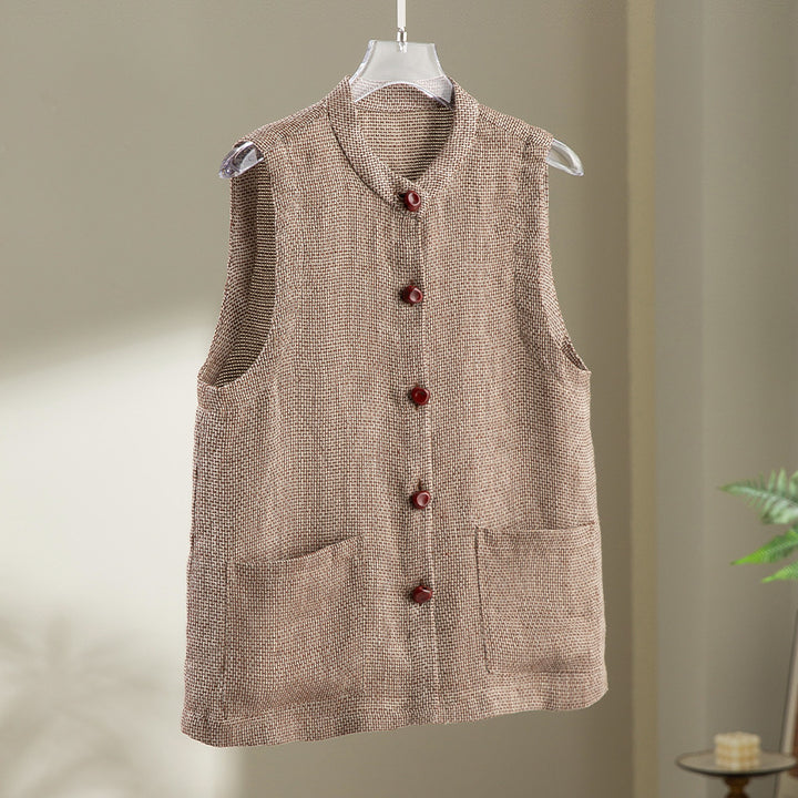 Women's sleeveless knit vest with stand-up collar, button placket, and patch pockets Mune Fashion