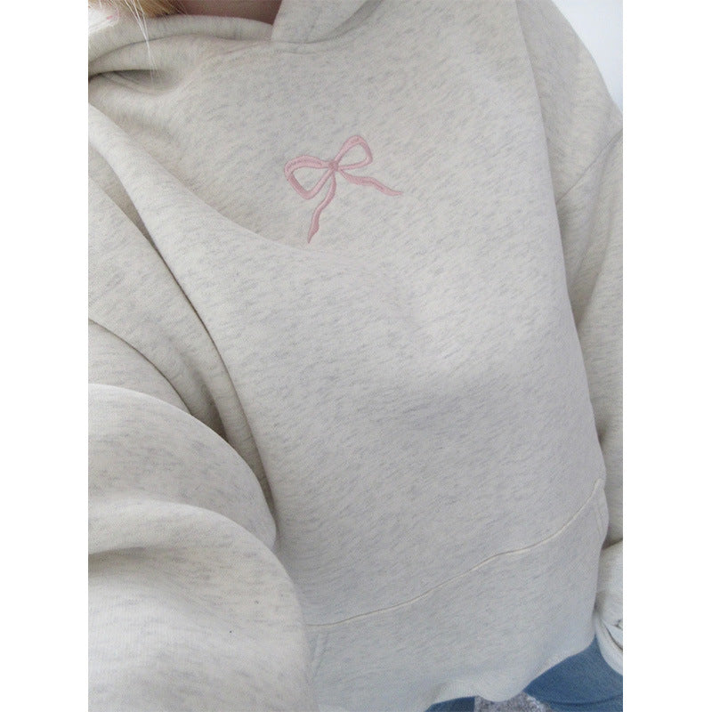 Women's hoodie with floral embroidery design and printed hood lining Mune Fashion