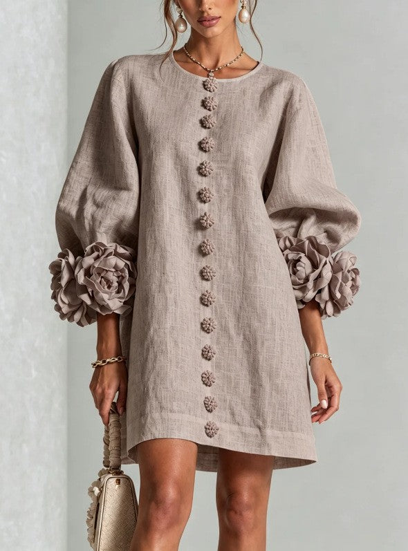 Women’s midi dress with voluminous puff sleeves, 3D flower button placket and linen texture Mune Fashion
