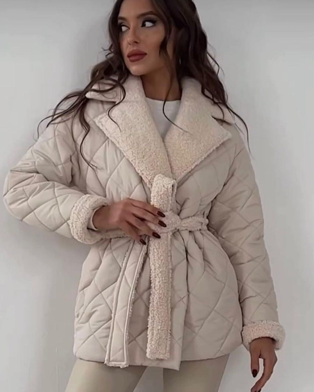 Women’s quilted jacket with teddy lining, fitted belt and large shawl collar Mune Fashion