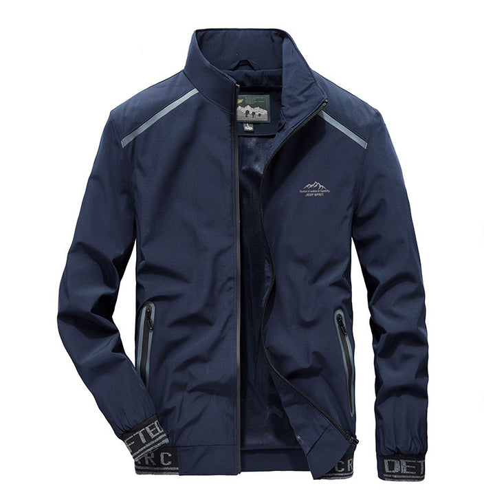 Men's softshell jacket with reflective inserts, water-repellent zip pockets, and high stand-up collar Mune Fashion