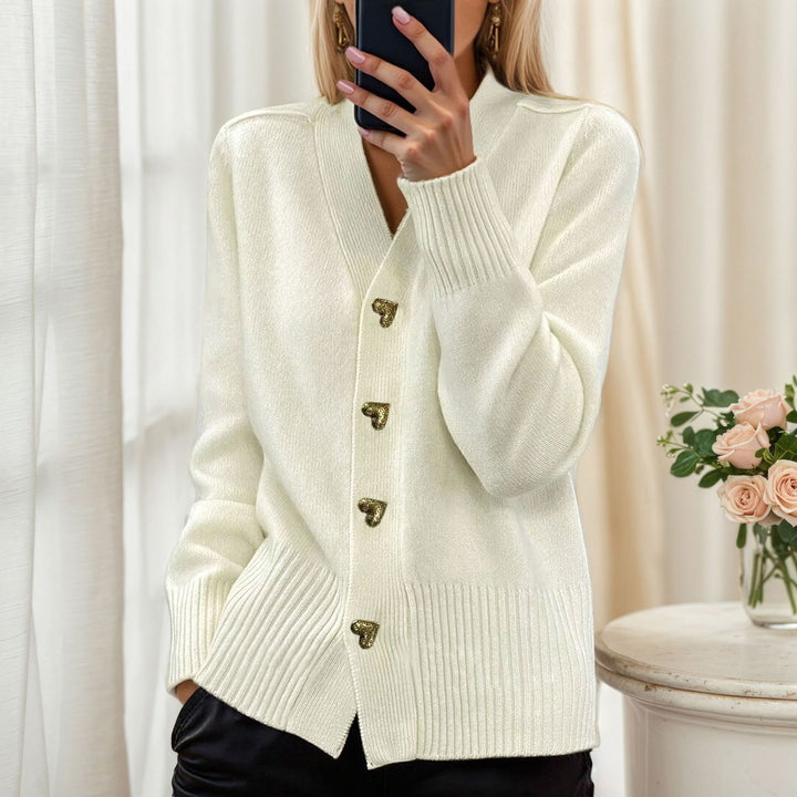 Women's loose knit cardigan with heart buttons and ribbed hem Mune Fashion
