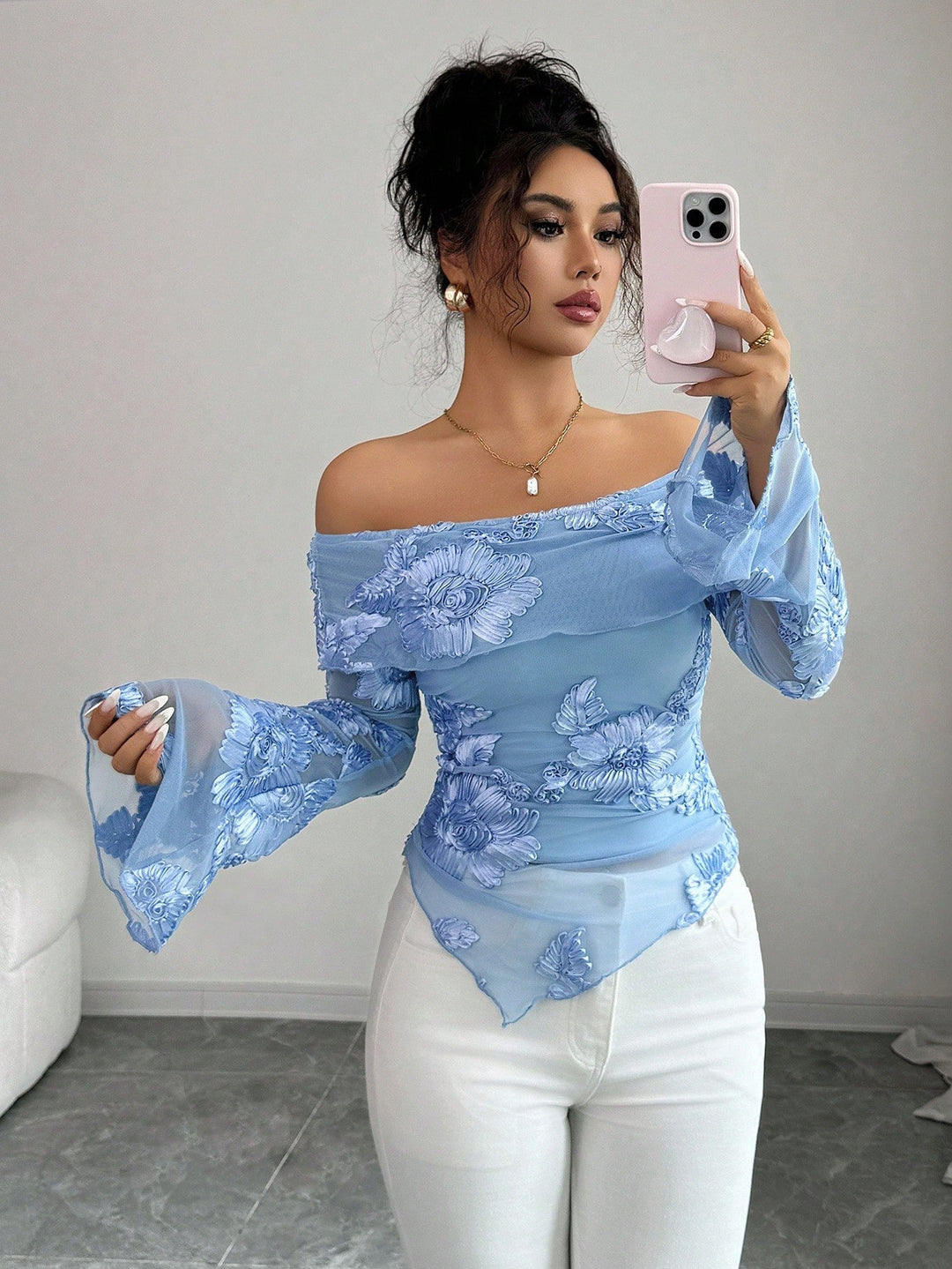 Ladies off-shoulder mesh top with three-dimensional lace appliqué, flared bell sleeves, and asymmetrical scalloped hem Mune Fashion
