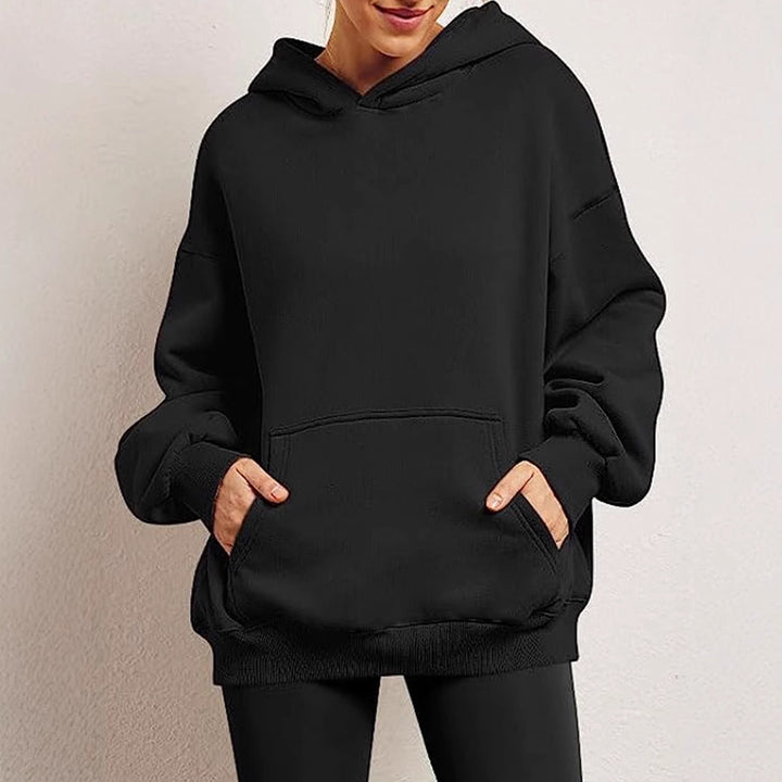 Women's oversized hoodie with extended back, fleecy interior, and kangaroo pocket Mune Fashion