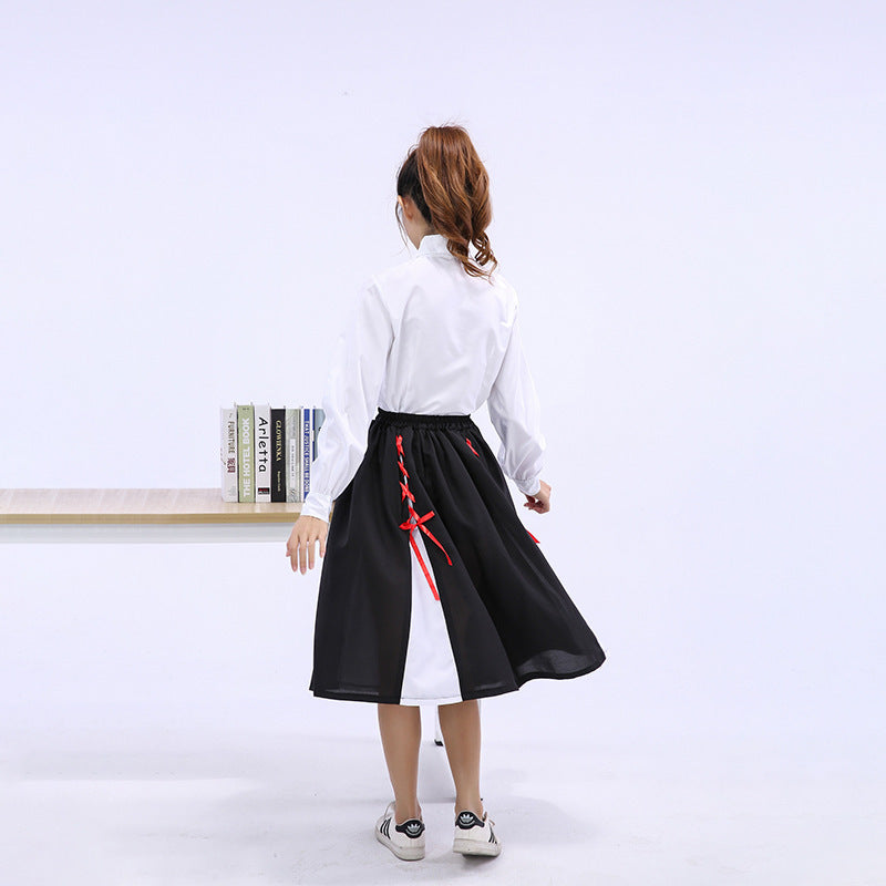 Girls Elegant Blouse with Ruffled Skirt and Bow Details Mune Fashion