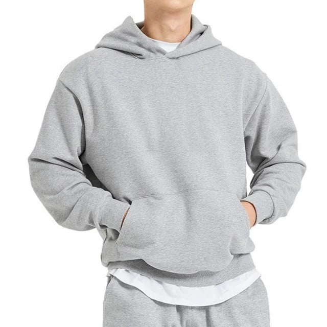 Men's heavy hooded sweatshirt in boxy cut with kangaroo pocket, ribbed hem, and soft brushed interior Mune Fashion