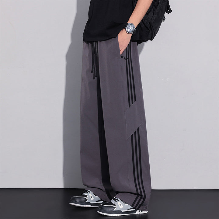 Men's sporty leisure pants with side stripes Mune Fashion