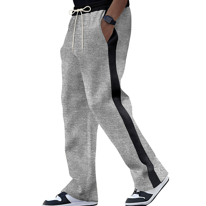 Men's loose-fitting jogging pants with contrast side stripes, elastic waistband and drawstring Mune Fashion