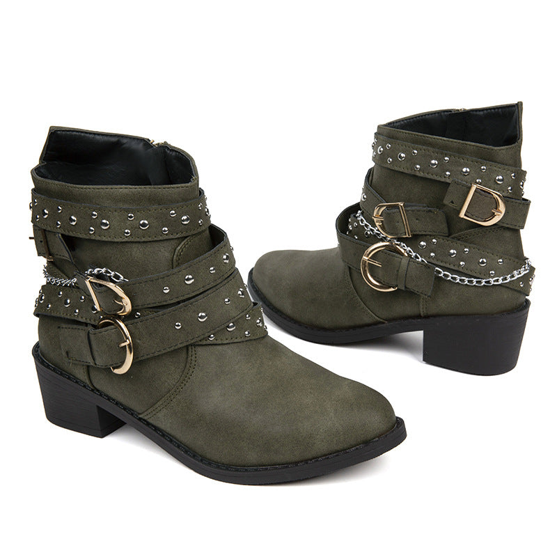 Women's ankle-height biker ankle boots with studded strap, chain and buckle details Mune Fashion