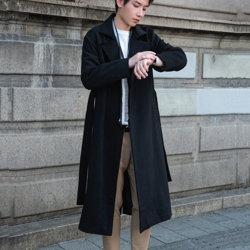 Men's long cut wool coat in minimalist design with generous shawl collar and concealed button placket Mune Fashion