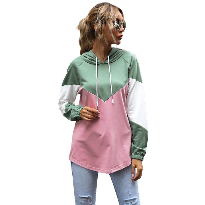 Women's Oversize Hooded Sweatshirt with Raglan Sleeves and Rounded Hem Mune Fashion