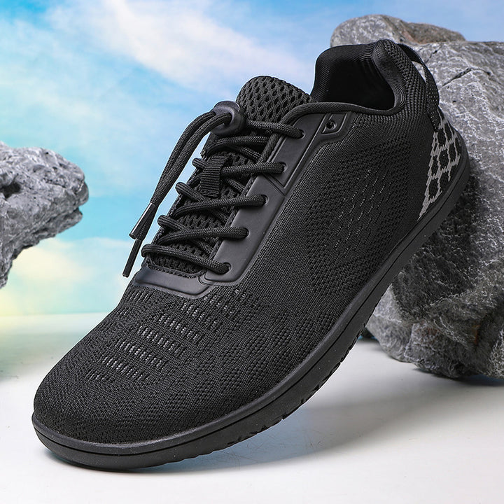 Unisex barefoot-inspired knitted sneaker with elastic fit, quick pull cord, and grippy full rubber sole Mune Fashion