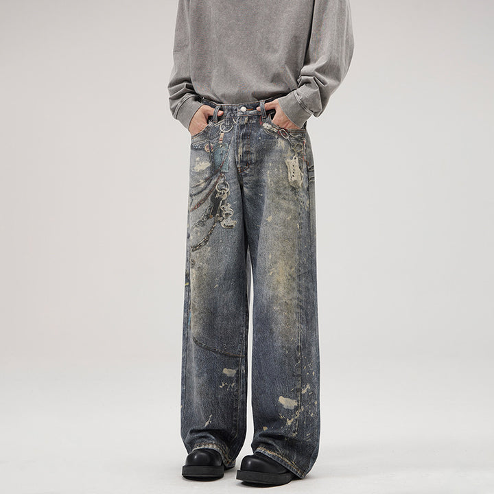 Men's Loose Fit Stonewashed Denim Jeans with Chain Print, Color Splatter and Floor-Length Hem Mune Fashion