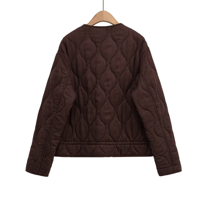 Women quilted transition jacket with zipper and button placket, round neck and drawstring Mune Fashion