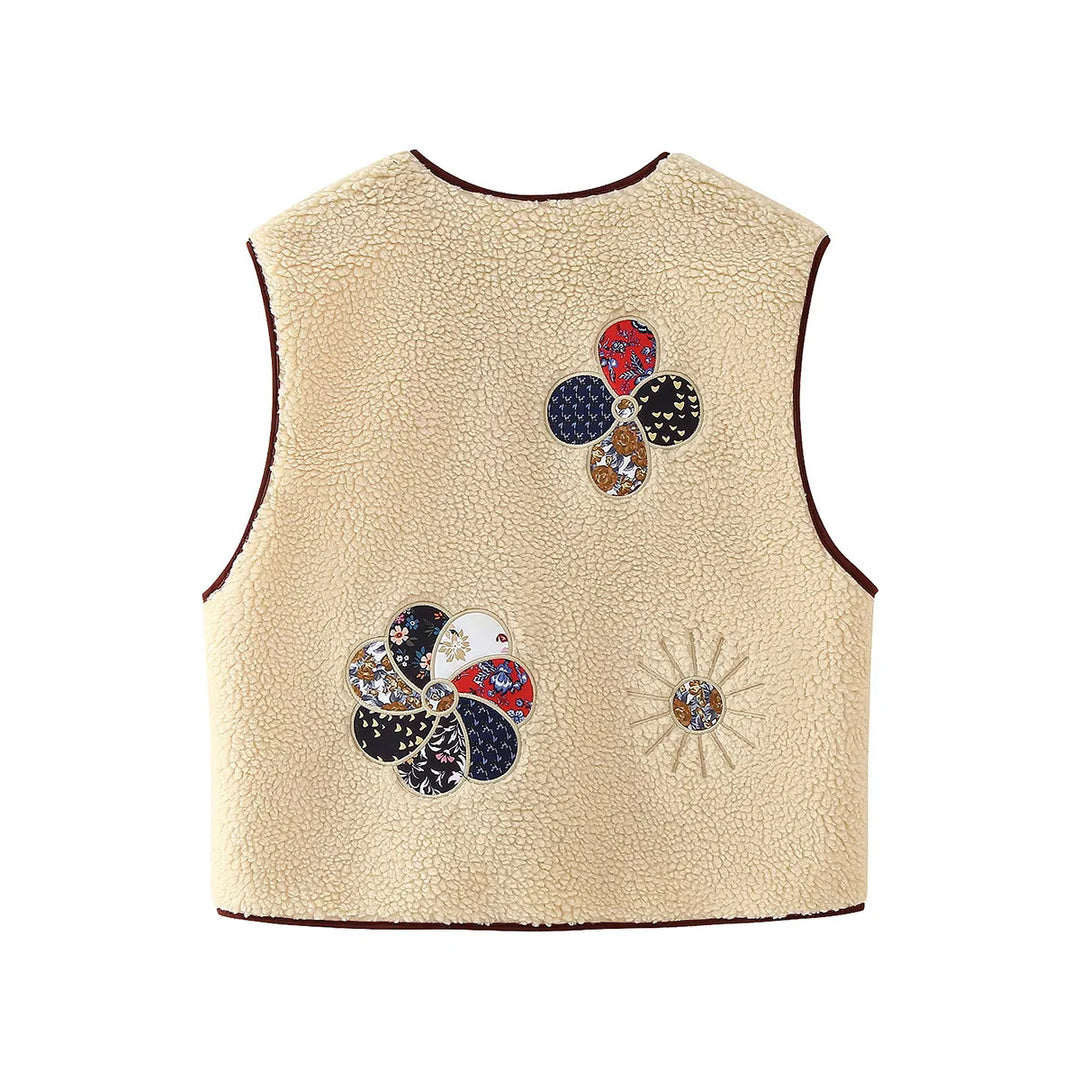 Women's sleeveless teddy vest with patchwork applications and wooden button closure Mune Fashion