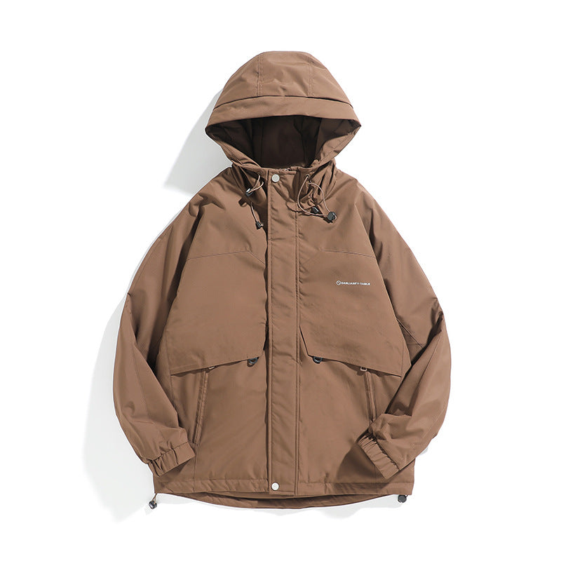 Unisex Wide cut weatherproof parka with hood, drawstring and patch pockets Mune Fashion