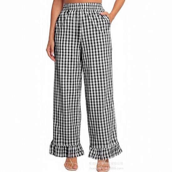 Women's palazzo pants with elastic waistband, side pockets, and ruffled hem Mune Fashion