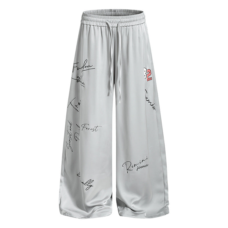 Women's Wide Satin Palazzo Lounge Pants with Elastic Waistband, Drawstring, and Script Print Mune Fashion