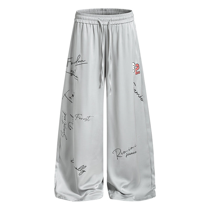 Women's Wide Satin Palazzo Lounge Pants with Elastic Waistband, Drawstring, and Script Print Mune Fashion