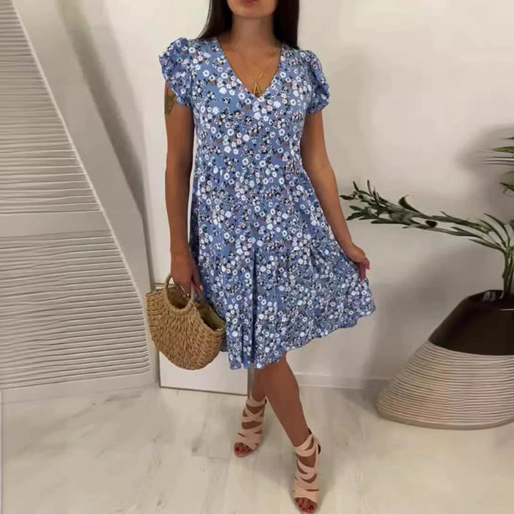 Women’s V-neck dress with gathered waist seam, short flounce sleeves, and tiered skirt Mune Fashion