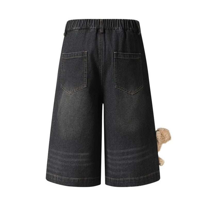 Women's playful denim culotte shorts with a high comfort waistband, allover doodle print & teddy pendant Mune Fashion