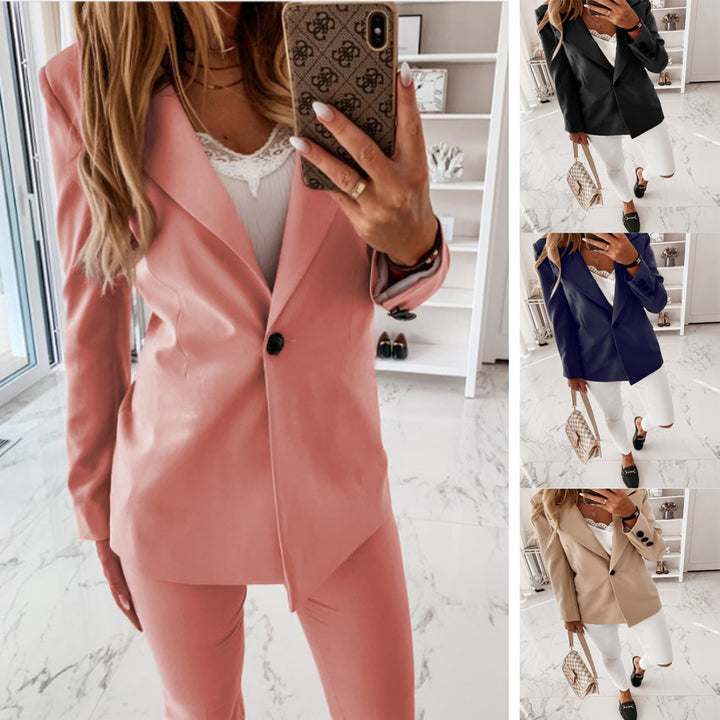 Women’s long blazer with single-breasted button placket, tailored fit, and soft shoulder pads Drune