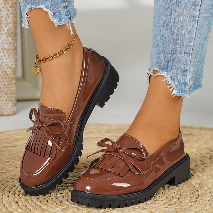 Women’s elegant patent plateau loafers with decorative bow and profiled rubber sole Mune Fashion