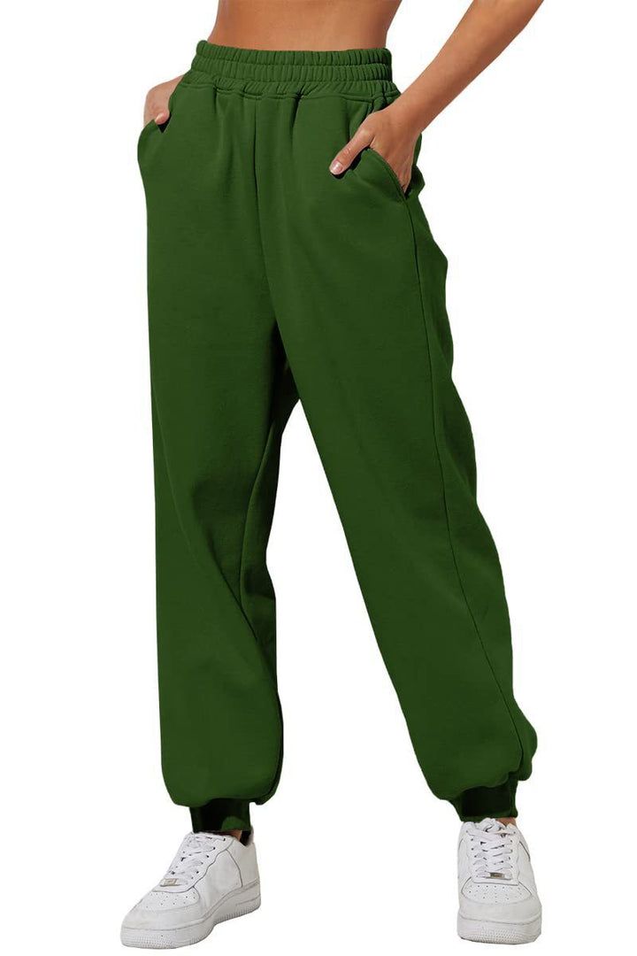 Women's relaxed high-waist jogging pants with double-layer comfort waistband, side pockets, and gathered ankle cuffs Mune Fashion