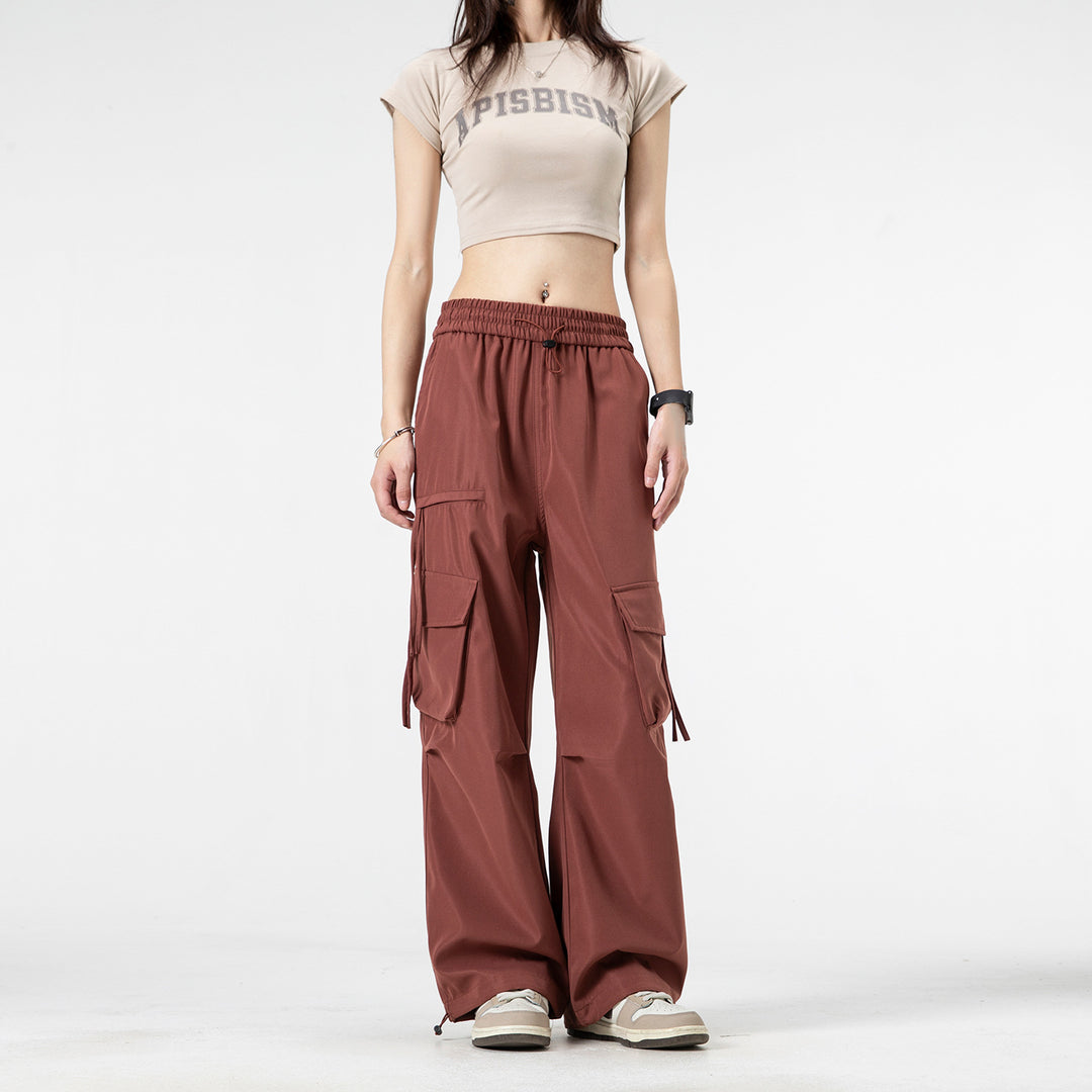 Damen Weite Cargo‑Hose im Baggy‑Cut mit elastischem Tunnelzugbund, Klapp‑Utility‑Taschen und verstellbarem Beinabschluss Mune Fashion