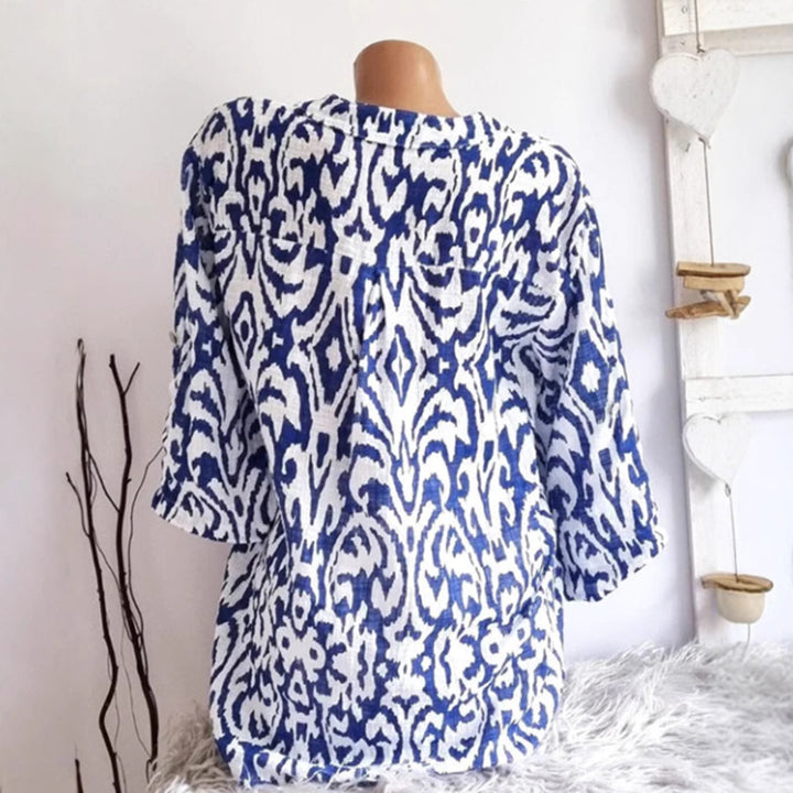 Women nan locker cut tunic blouse with Ikat pattern, V-neck and three-quarter sleeves Mune Fashion