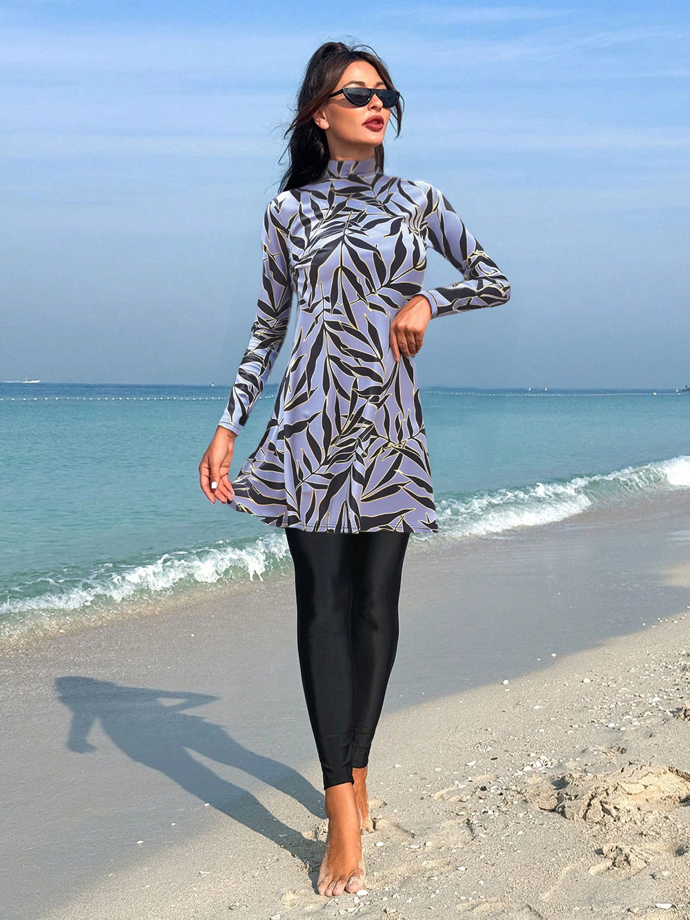 Women's fashionable UV protection swimsuit with long sleeves and asymmetric hem Mune Fashion