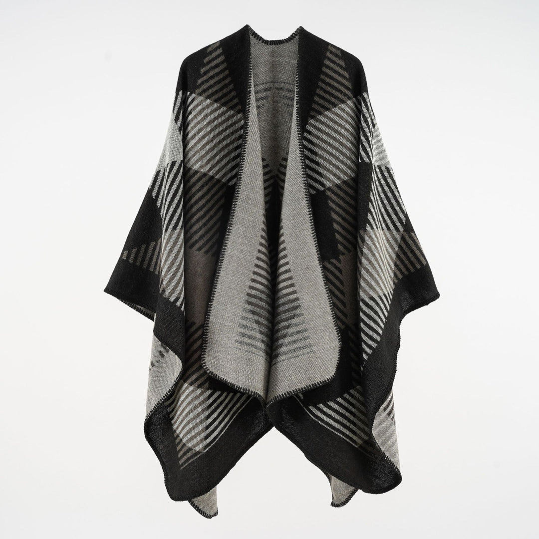 Women’s cape poncho made of wool blend with geometric striped jacquard and open edge seam Mune Fashion