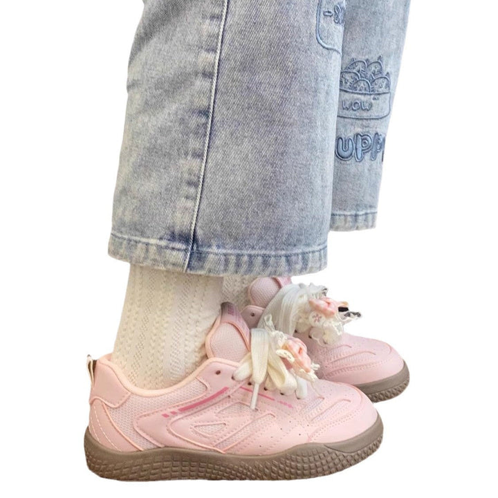 Women's sneakers with playful bow design by Mune Fashion