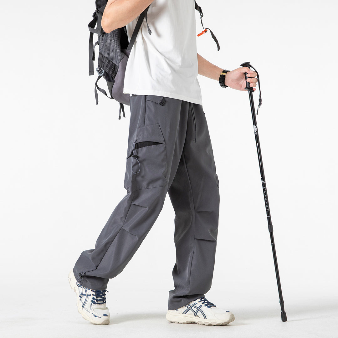 Men's Oversized Cargo Pants with Drawstring Waist, Multifunctional Flap and Leg Pockets, and Adjustable Cord Endings Mune Fashion