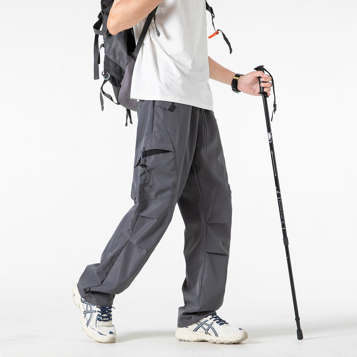 Men's Oversized Cargo Pants with Drawstring Waist, Multifunctional Flap and Leg Pockets, and Adjustable Cord Endings Mune Fashion